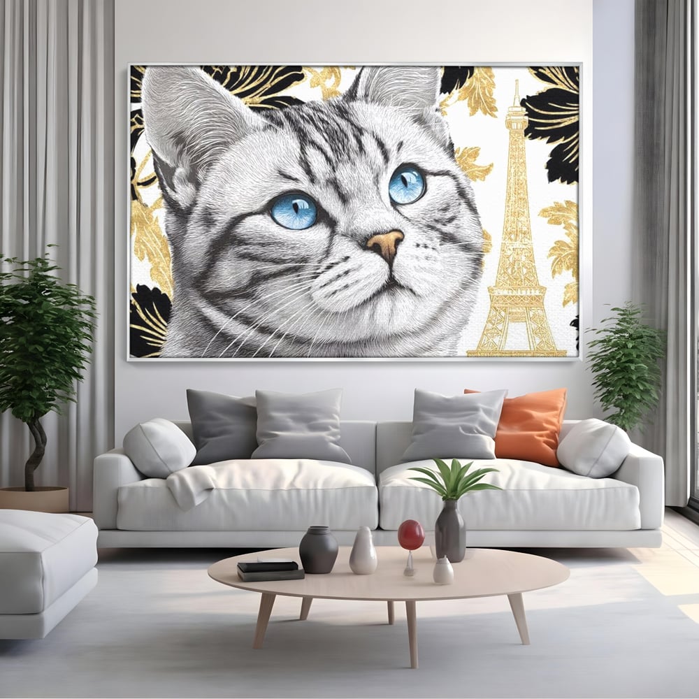 Tablou canvas cu tablou canvas cu pisica si turnul eiffel, in rama de aluminiu argintiu, pe perete intr-un living